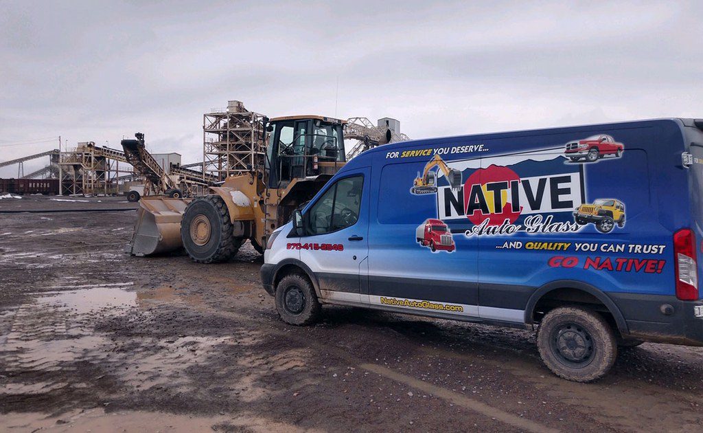 Native Auto Glass service van at worksite.